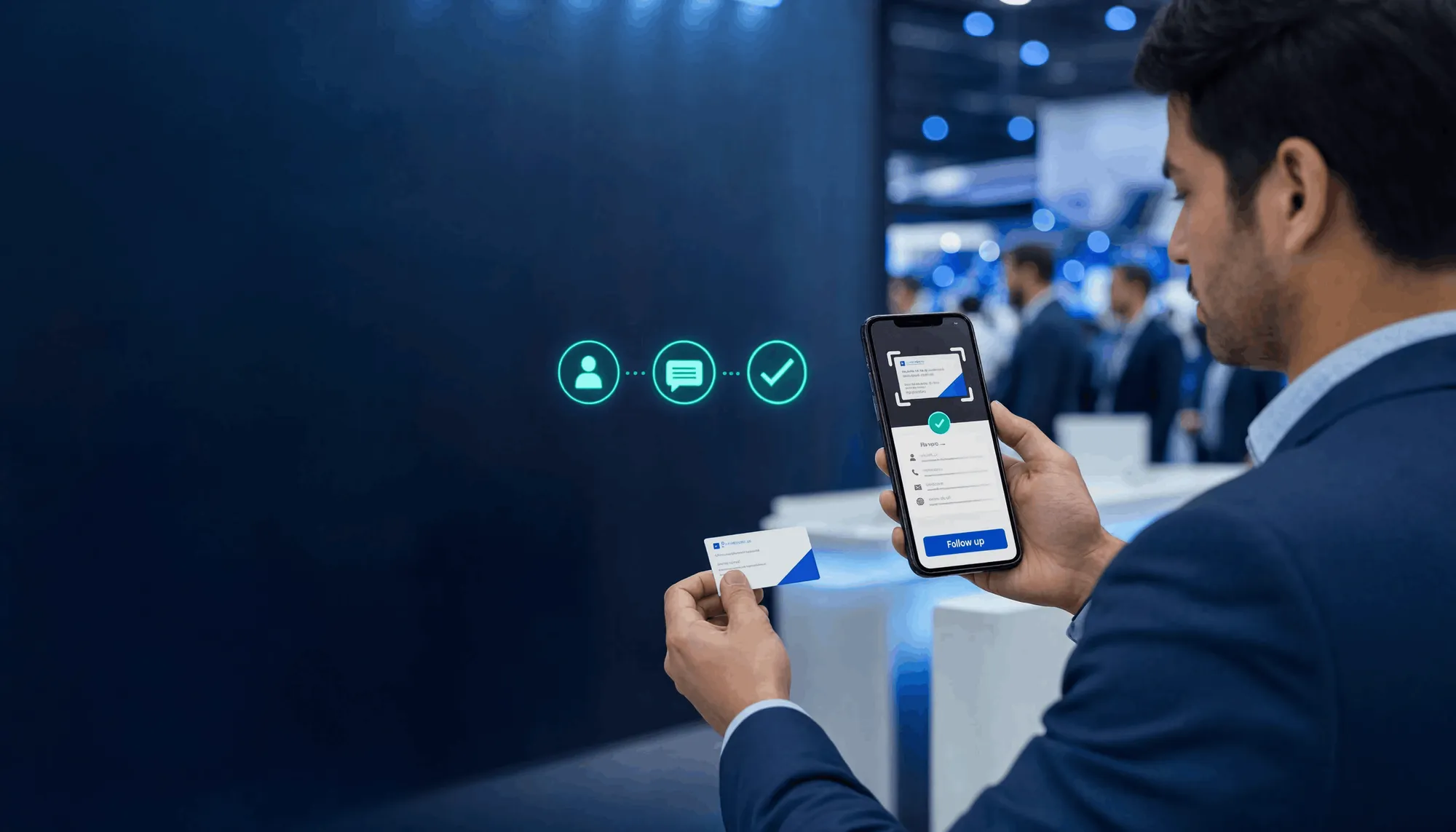 Sales professional scanning a business card with Kauntech at a trade show for offline lead capture.